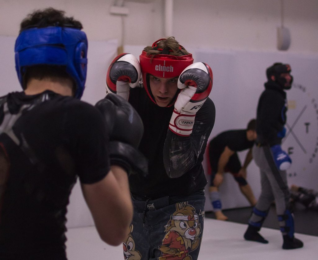 Boxers training together in a boxing club